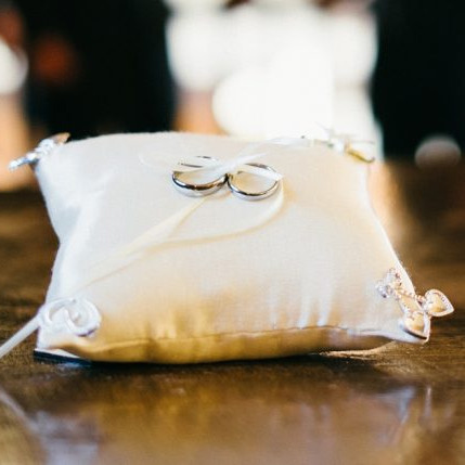 Wedding rings on pillow